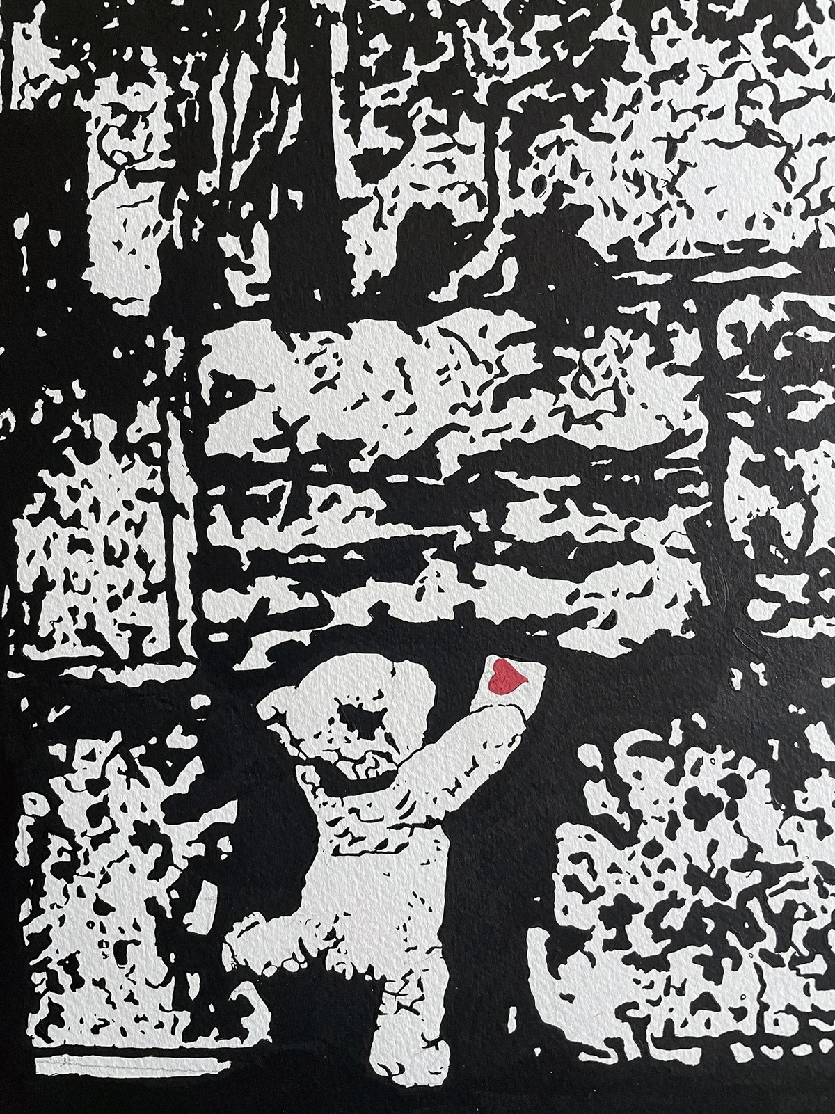 Detail of the teddy bear and red heart in the 2026 Bring Him Home