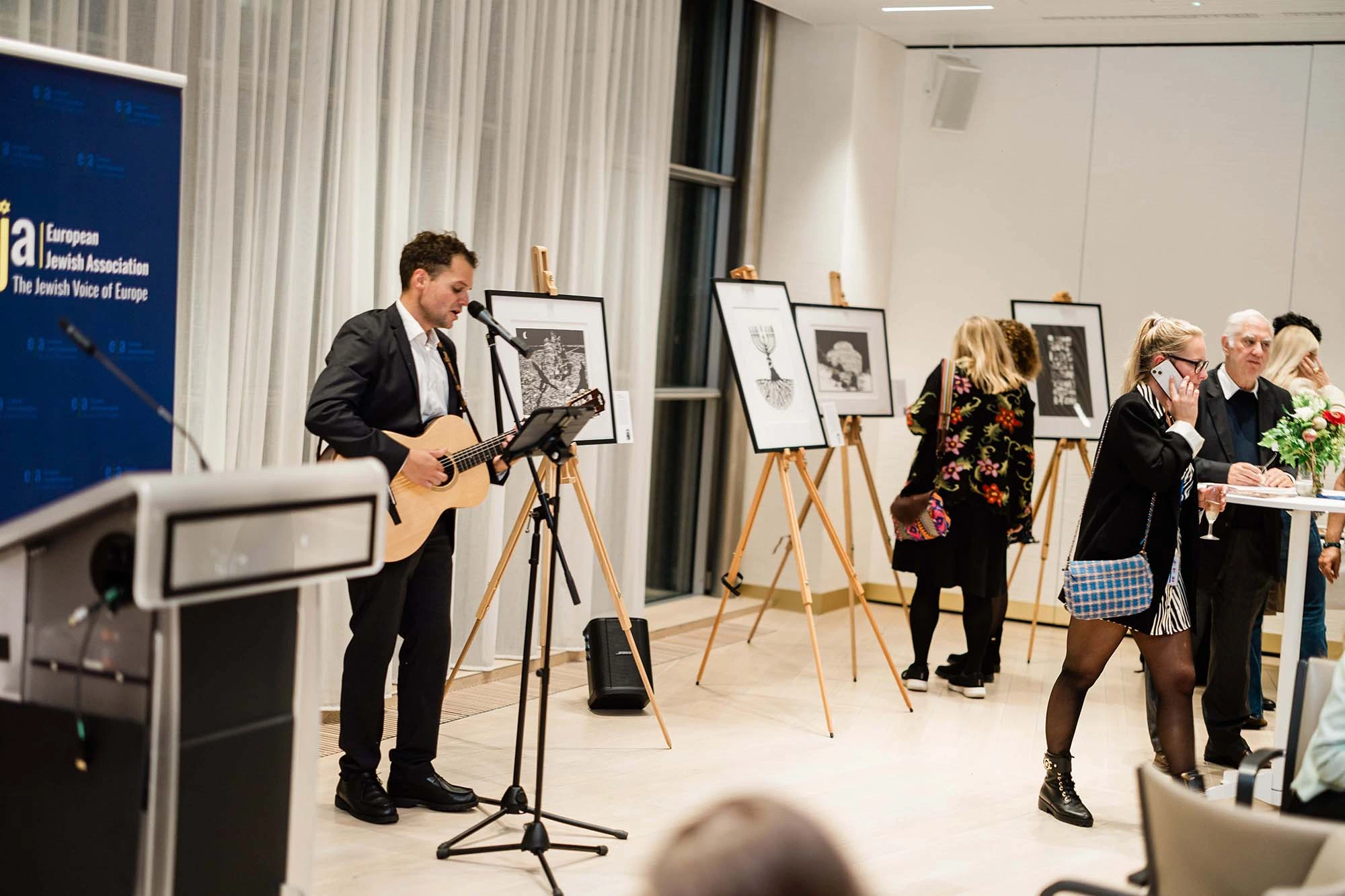 Lithographs displayed on easels in the Members' Salon