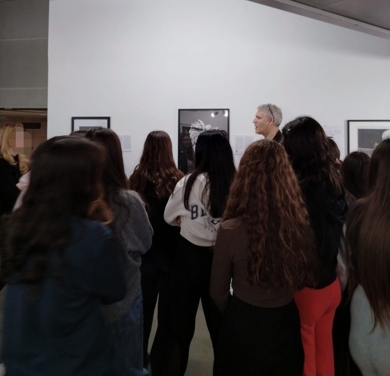Teenage students visiting the Teloglion exhibition