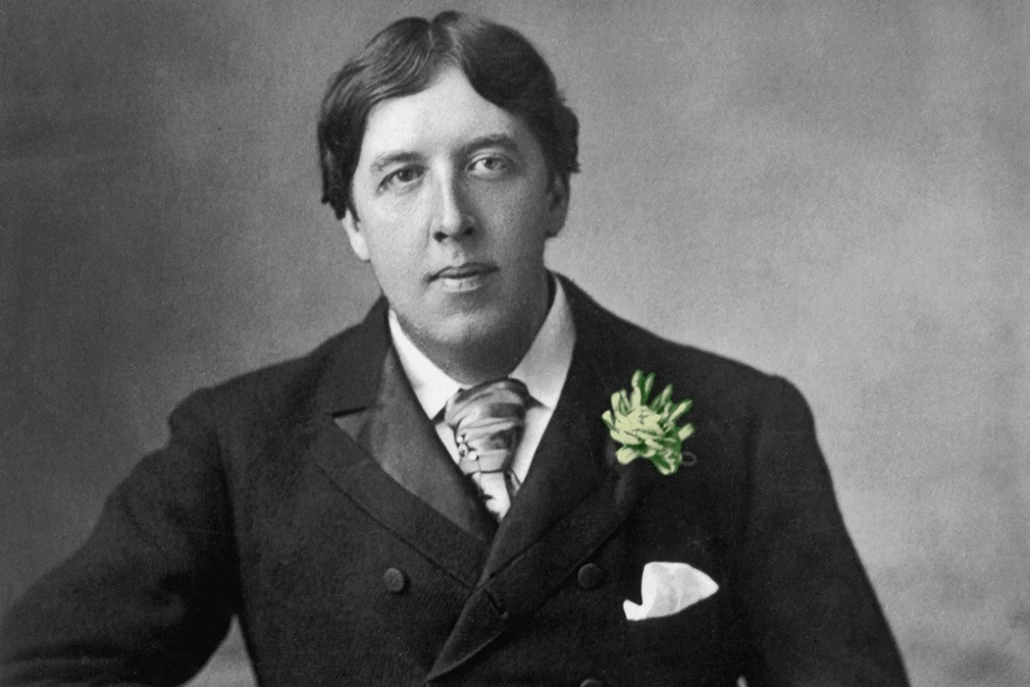 Oscar Wilde wearing a green carnation